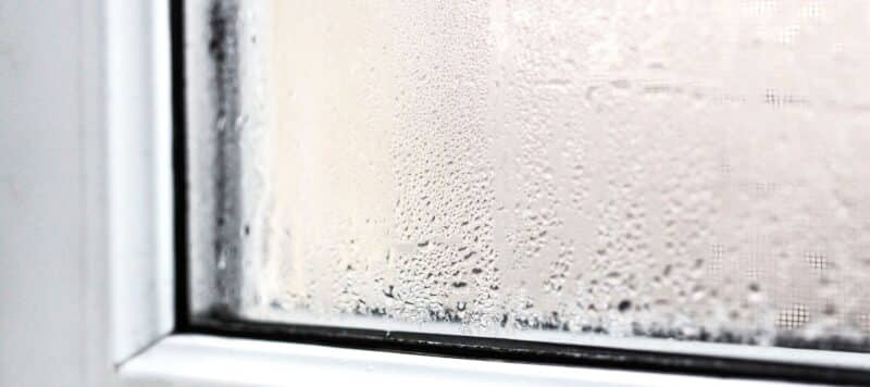 a home's window covered in condensation